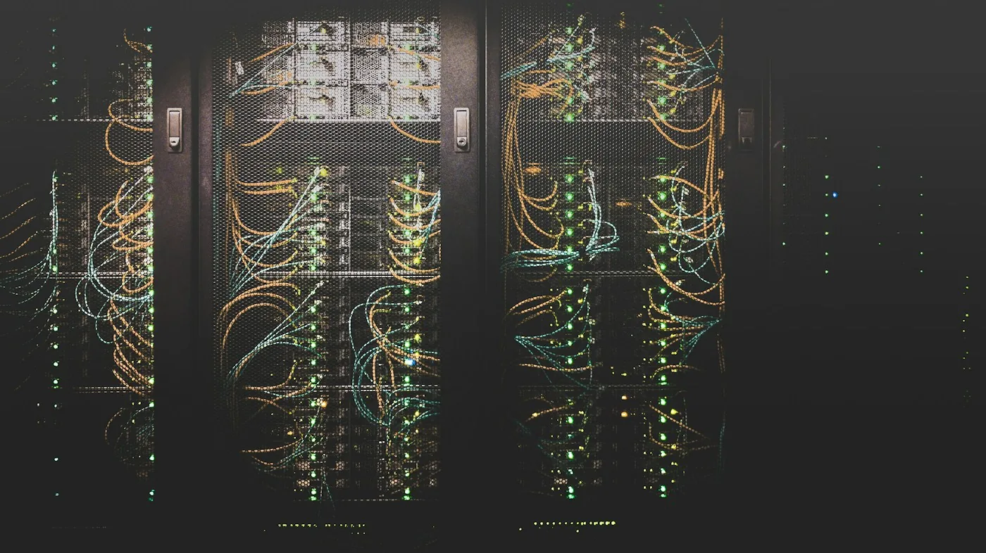 Server racks with network cabling in a data center